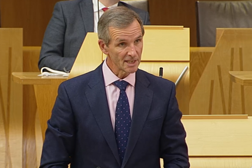 Liam speaking in chamber